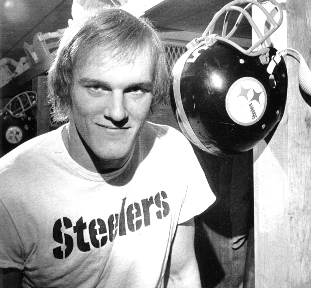 Linebacker Jack Lambert of the Pittsburgh Steelers, Sept. 25, 1975, wearing a Steelers wordmark t-shirt after a practice session. (AP Photo/Harry Cabluck)