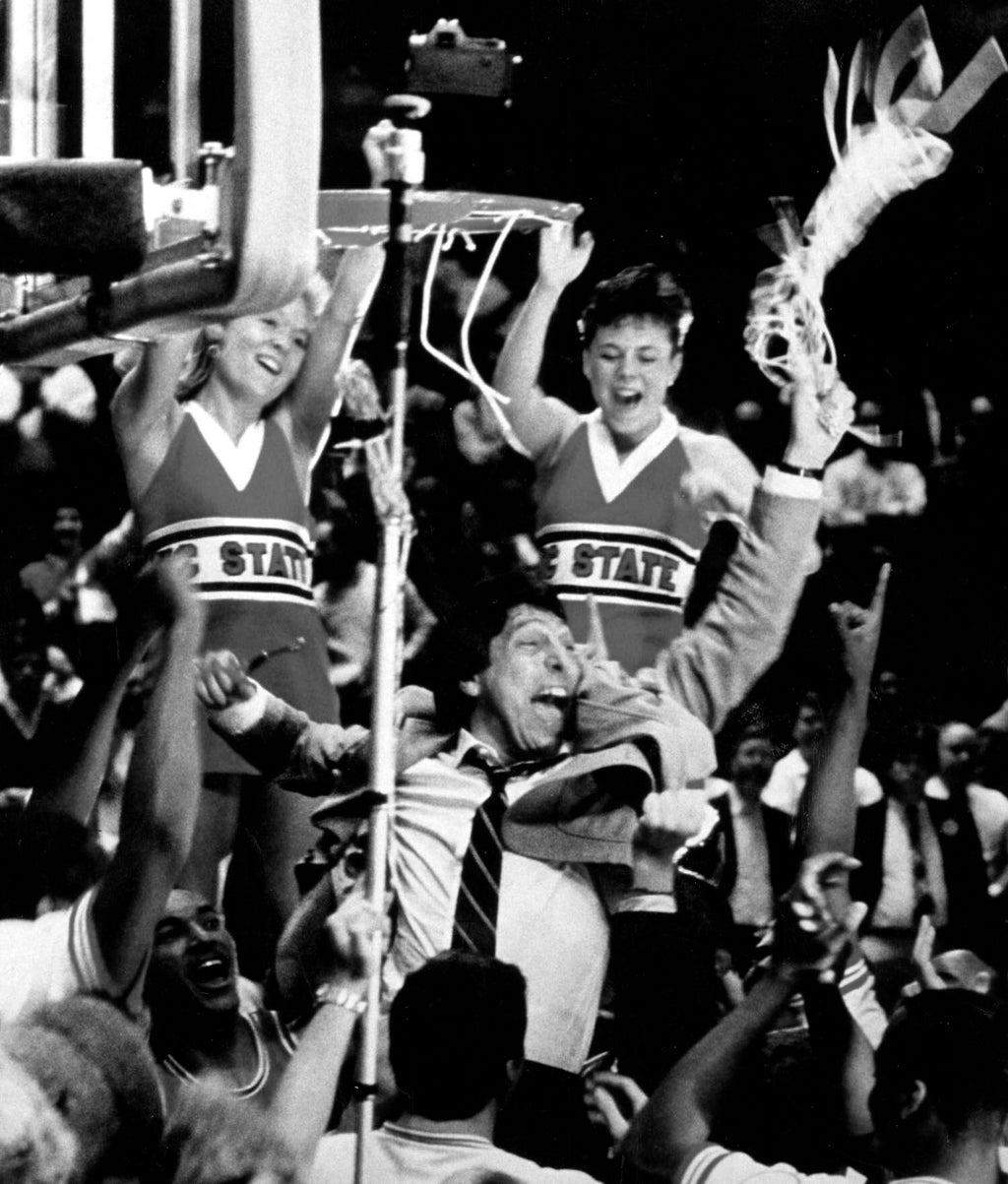 1983 NCAA Championship. An NC State team that asked, "Why Not Us?" And, a celebration that still defines what heart looks like.